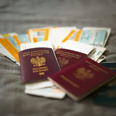 Home Close-up of Polish passports and travel tickets symbolizing travel and adventure.
